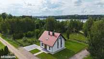 Nowy dom nad jeziorem Szelment z prywatną plażą