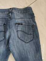 Spodnie dżinsowe Lee W25 L31