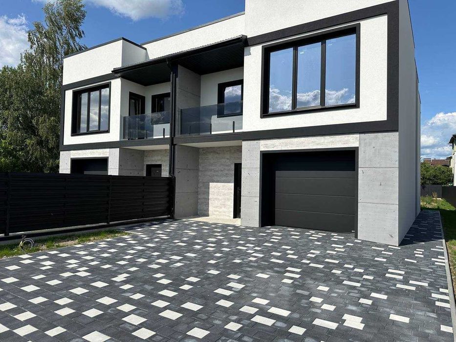 ПРЕМІУМ ЯКІСТЬ Дуплекс 135м2 з гаражем 5 сот землі, міські комунікації