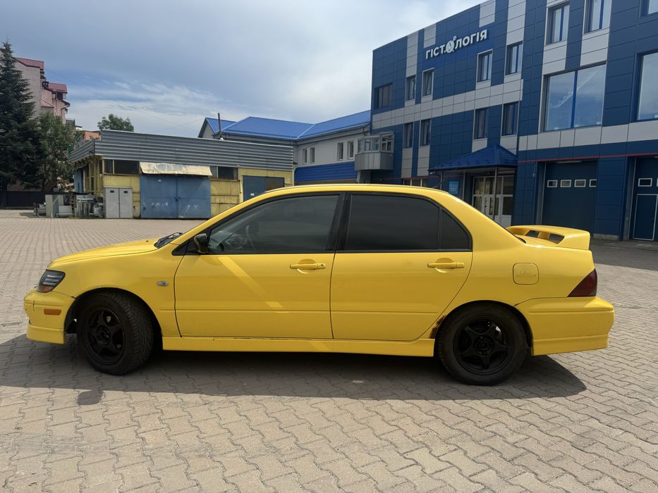 Продам Mitsubishi Lancer 2002