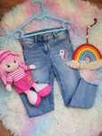 Jasne spodnie jeans na gumce z jednorożcem 104