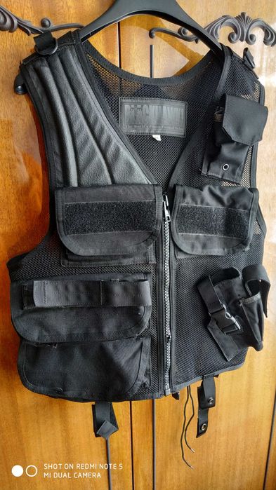 Разгрузка жилет BLACKHAWK .