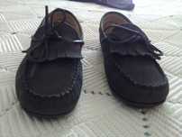 Sapatos azuis novos