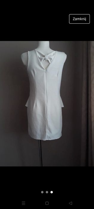 Biała sukienka z baskinką 40 L