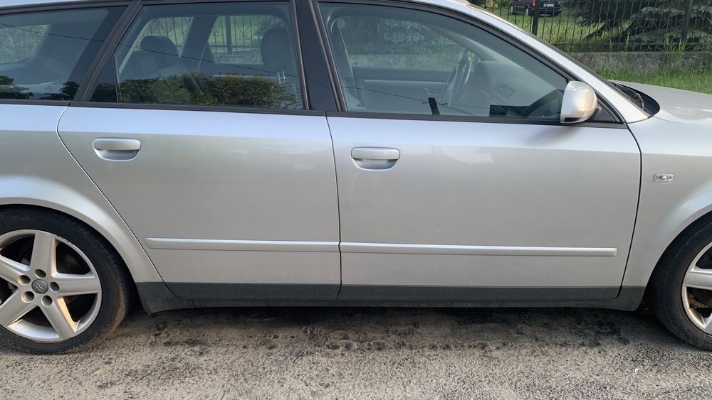 AUDI A4 B6 drzwi w kolor srebrne LY7W przód tył prawe lewe