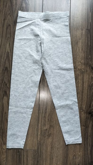 Legginsy 134/140 stan idealny jak nowe srebrna nitka