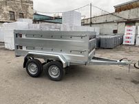 Двух вісний причіп Урса, Ursa від виробника бортовий оцинкований