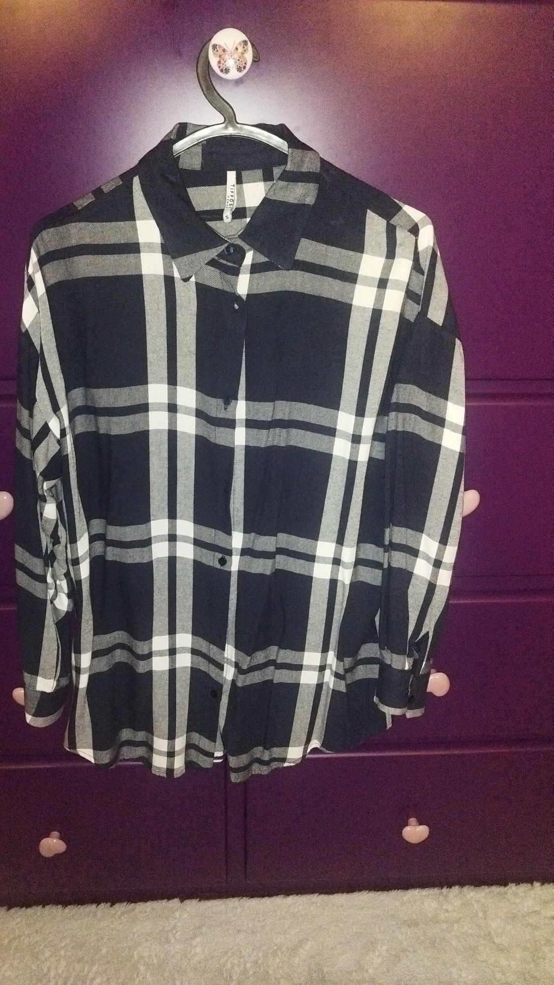 Camisa xadrez azul e branca