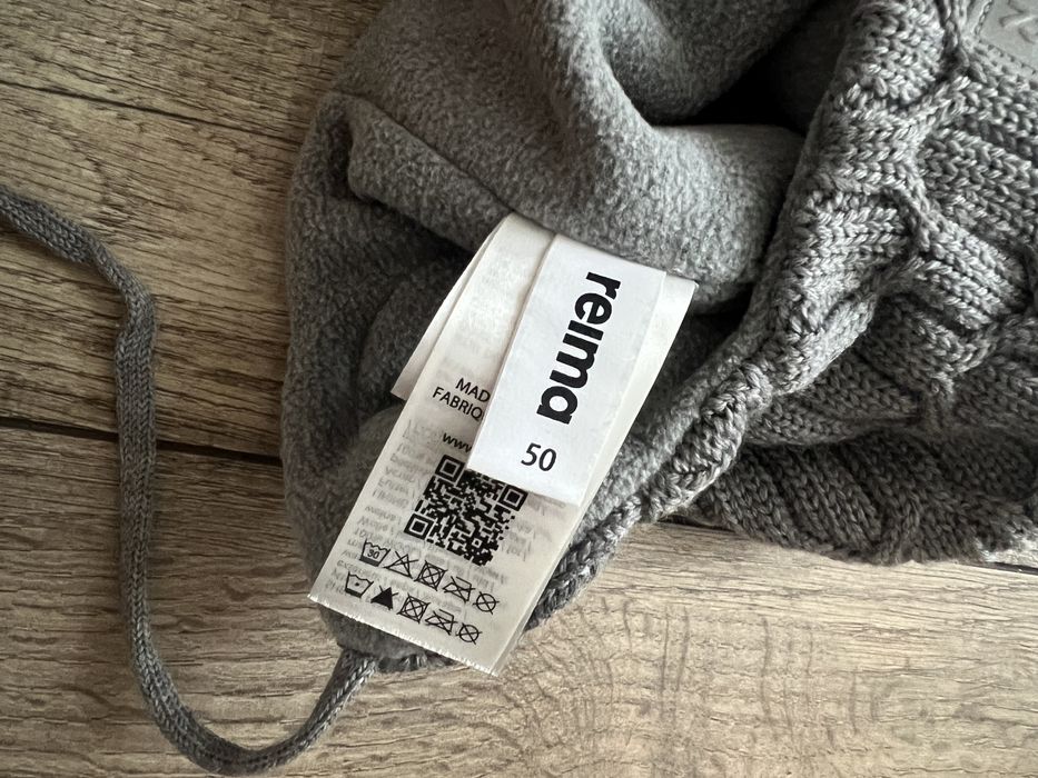 Дитяча зимова шапка із завʼязками Reima