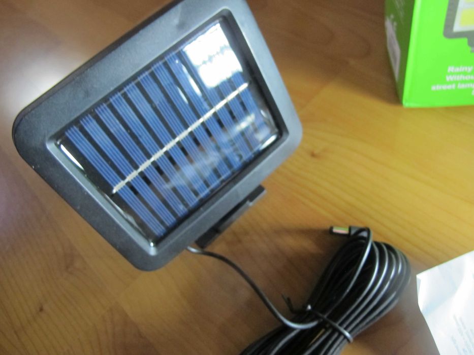 LED лампа + сонячна батарея + пульт ду і датчик руху