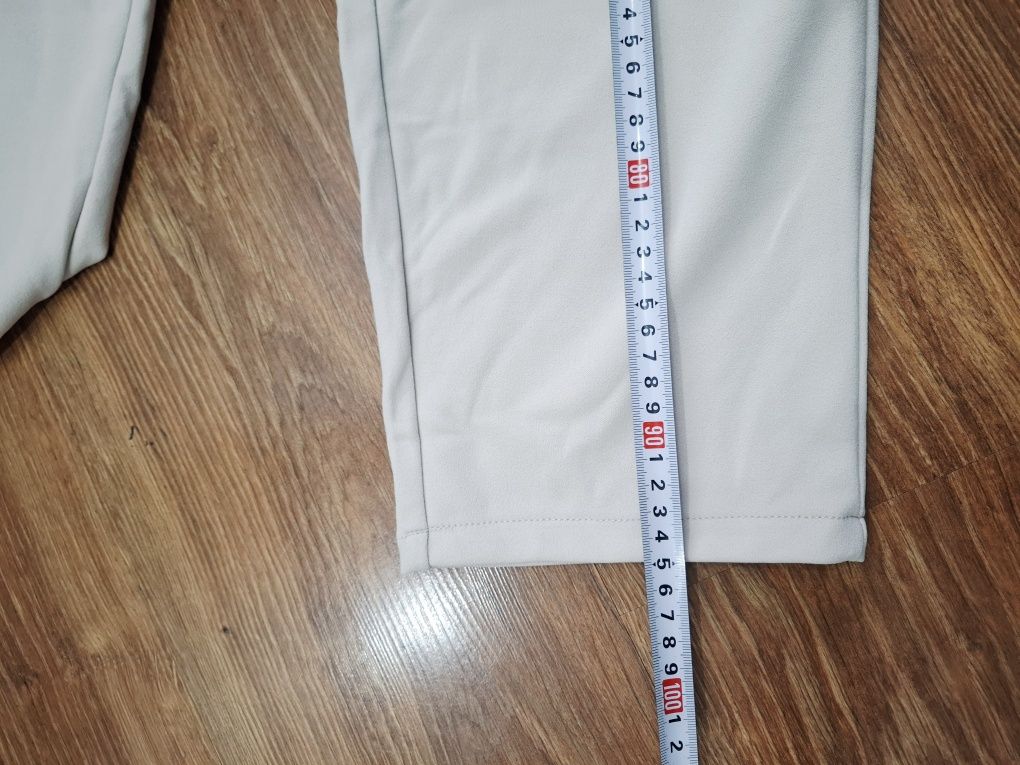 Nowe beżowe spodnie casual reserved l 40