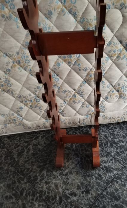 Expositor de pistolas ou espadas