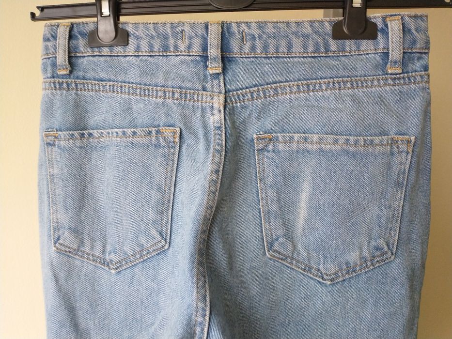 Spodnie jeansowe z dziurami i przetarciami wysoki stan Zero r. 36