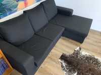 Sofá preto com chaise longue