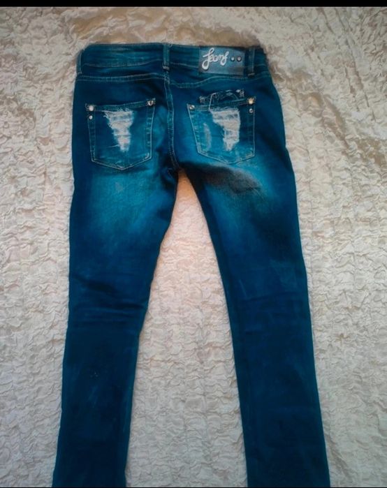 Spodnie z dziurami r 27