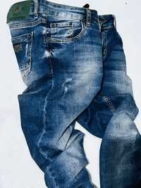 Spodnie Dsquared2 jeansowe niebieskie stretch dziury