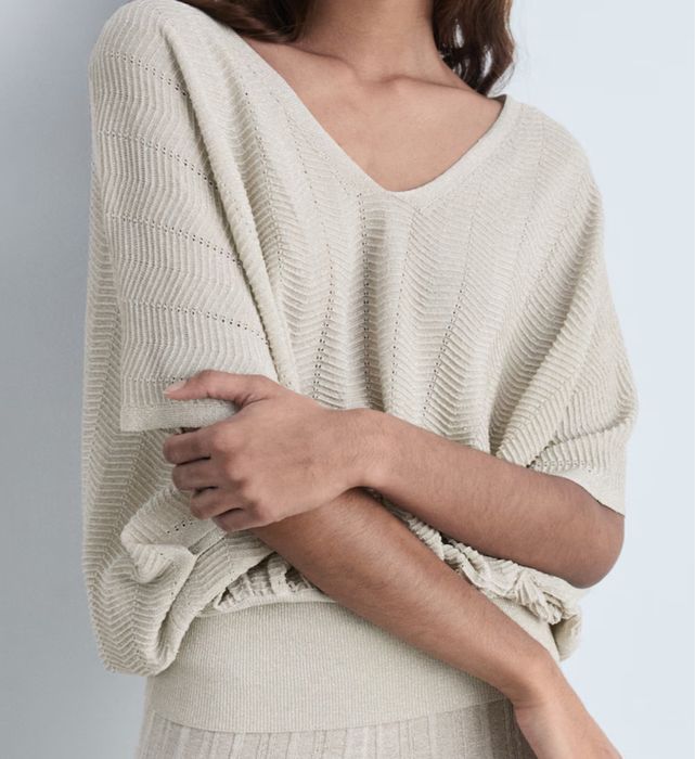 Ażurowa bluzka z połyskiem Mango