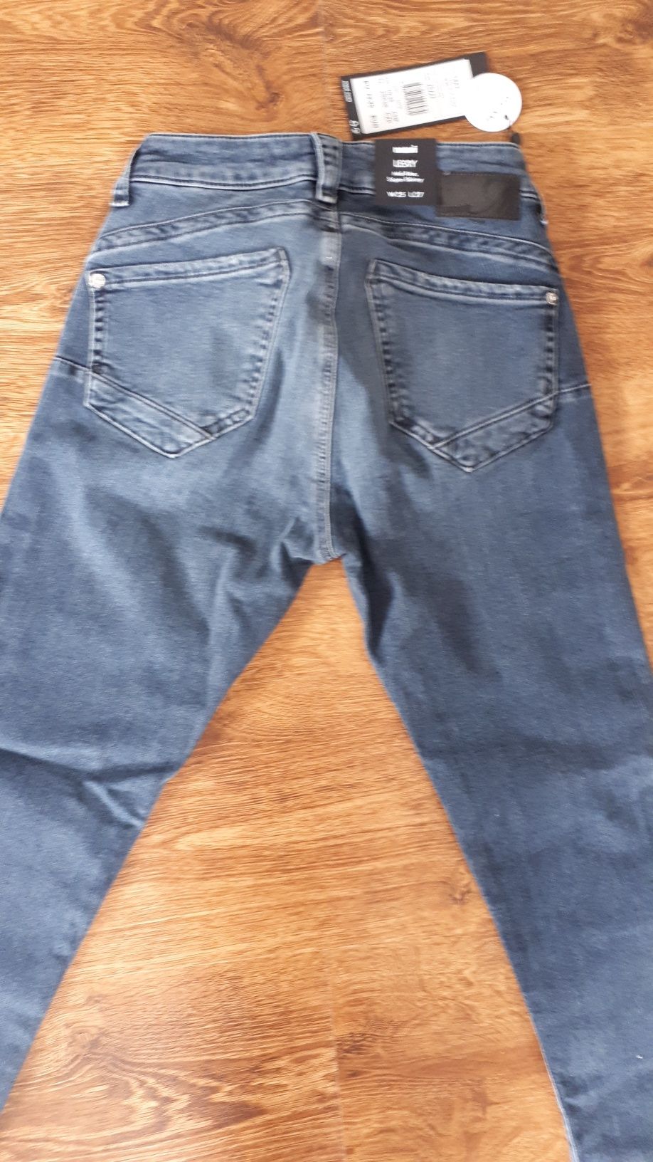 Spodnie damskie jeansowe push up XS
