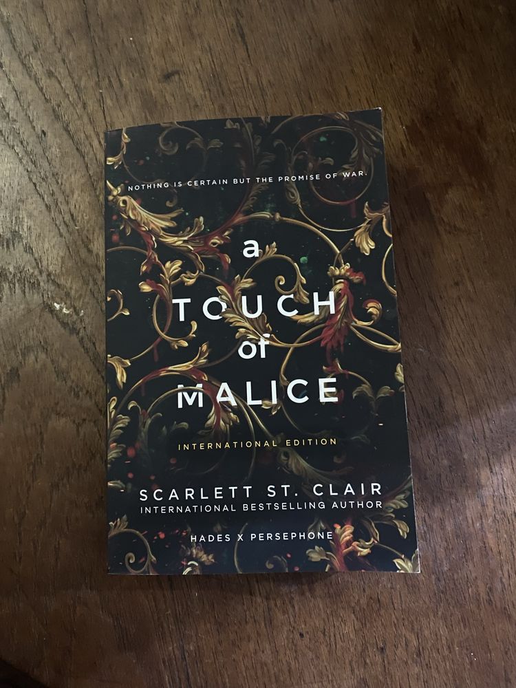 A touch of darkness and a touch of malice by Scarlet st. Clair