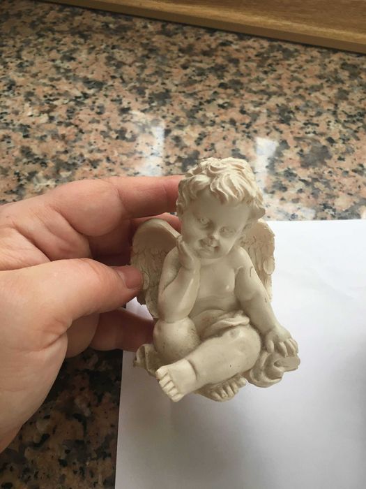 Anjos decorativos usados