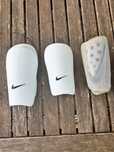 3 pares de caneleiras da nike , por um bom preço !!