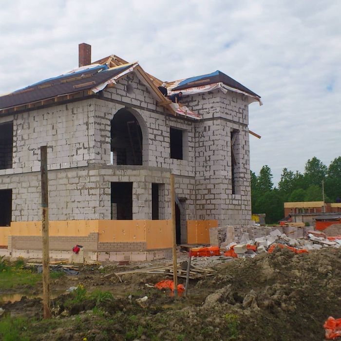 Фундаменти.Будівництво будинку.Будівельники . Будівельні роботи