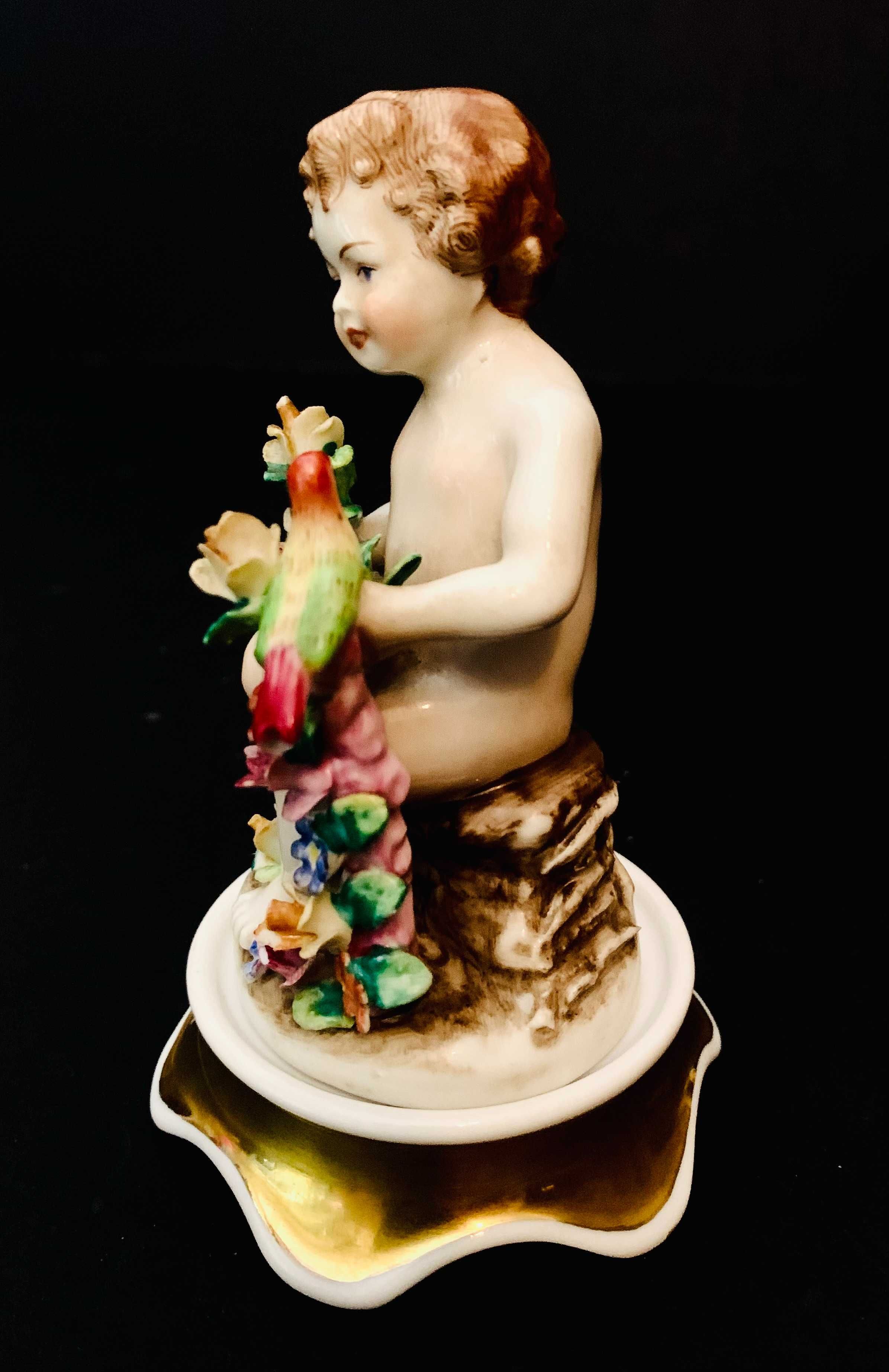 Estatueta Putti "Primavera" porcelana Artibus-Antiga