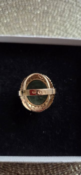 Pierścionek złoty PRL zielone oczko