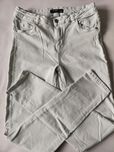 Jeans seledynowe spodnie Reserved 38