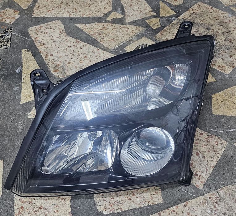 Optica esquerda Opel Astra C