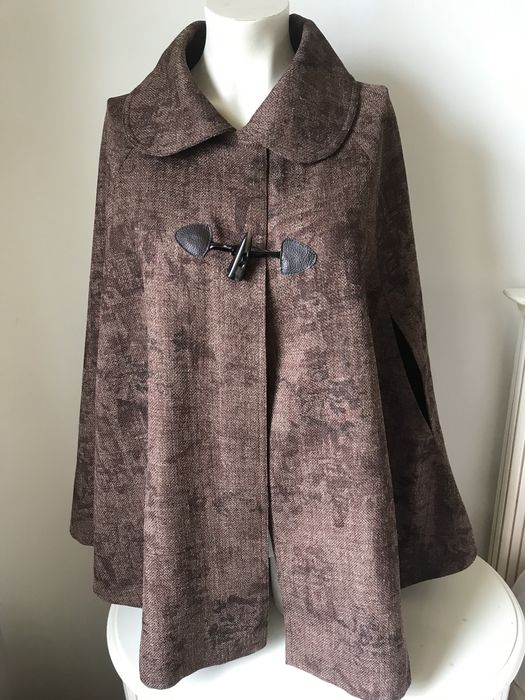 Capas e Poncho NOVOS ou Usadas 1 vez