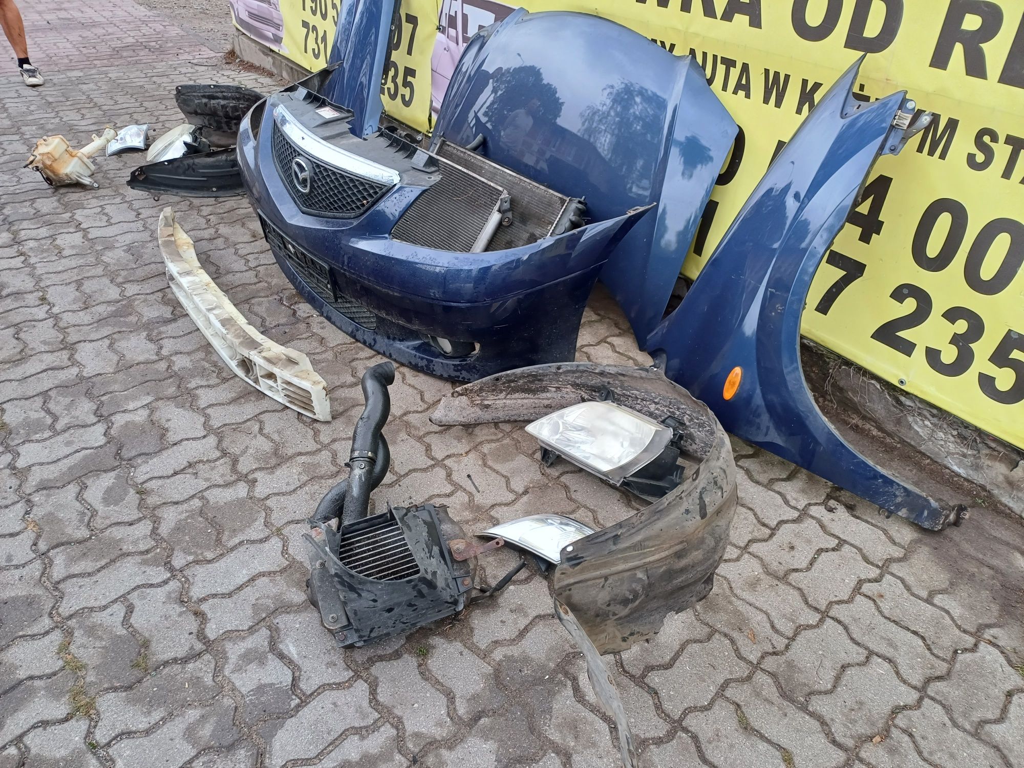 Mazda MPV maska zderzak błotnik chłodnica lampa belka KPL