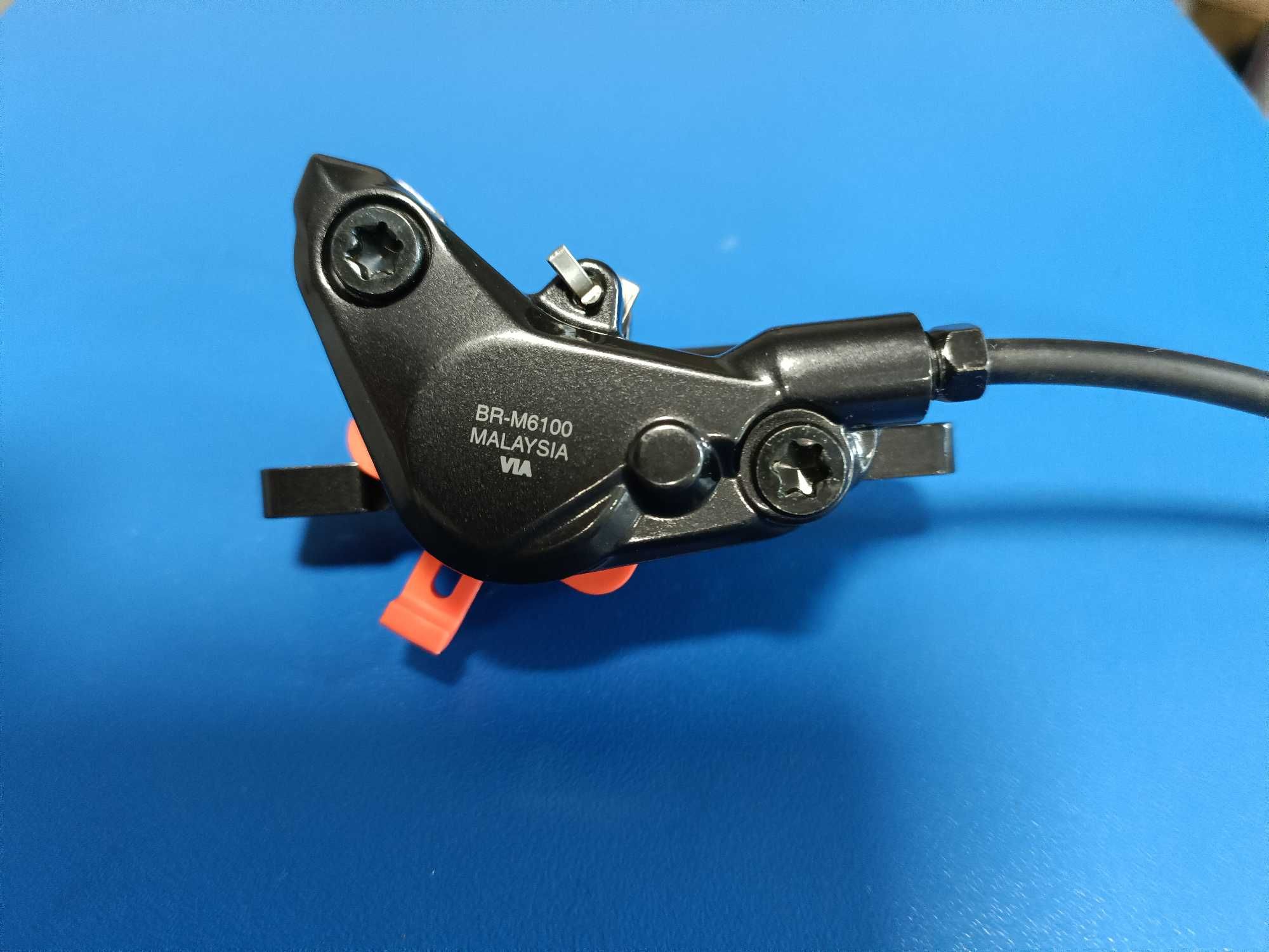 Тормоз гидравлический Shimano Deore M6100 передний/Адаптеры