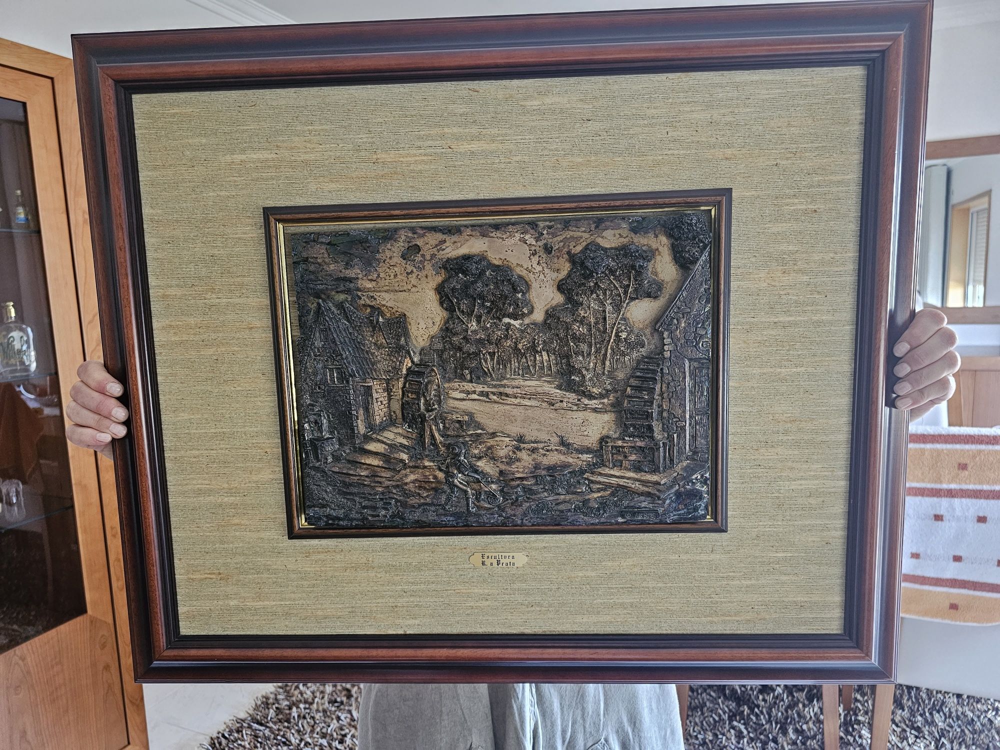 Quadro em prata no centro