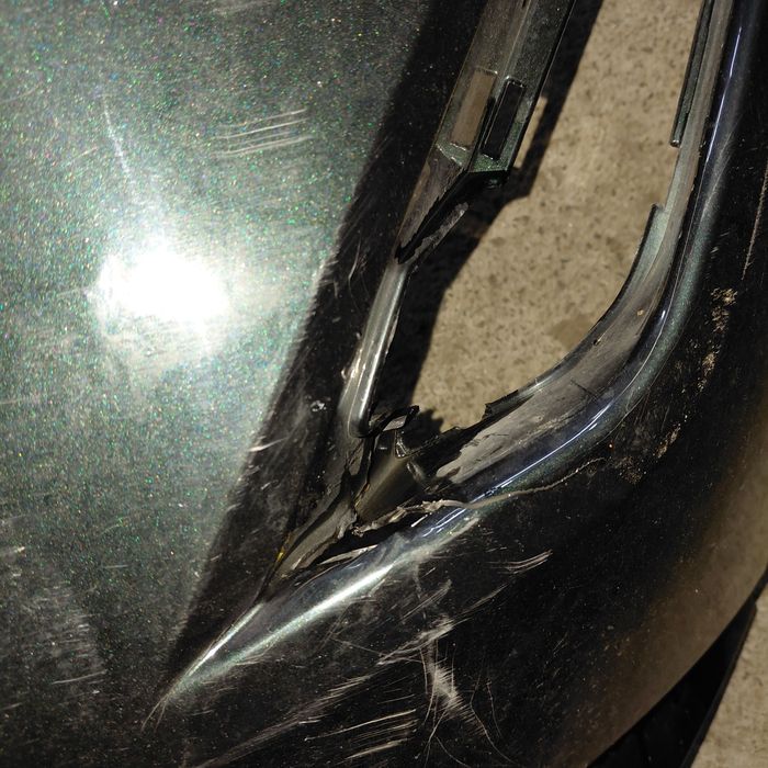 Бампер ніссан арія ліва частина