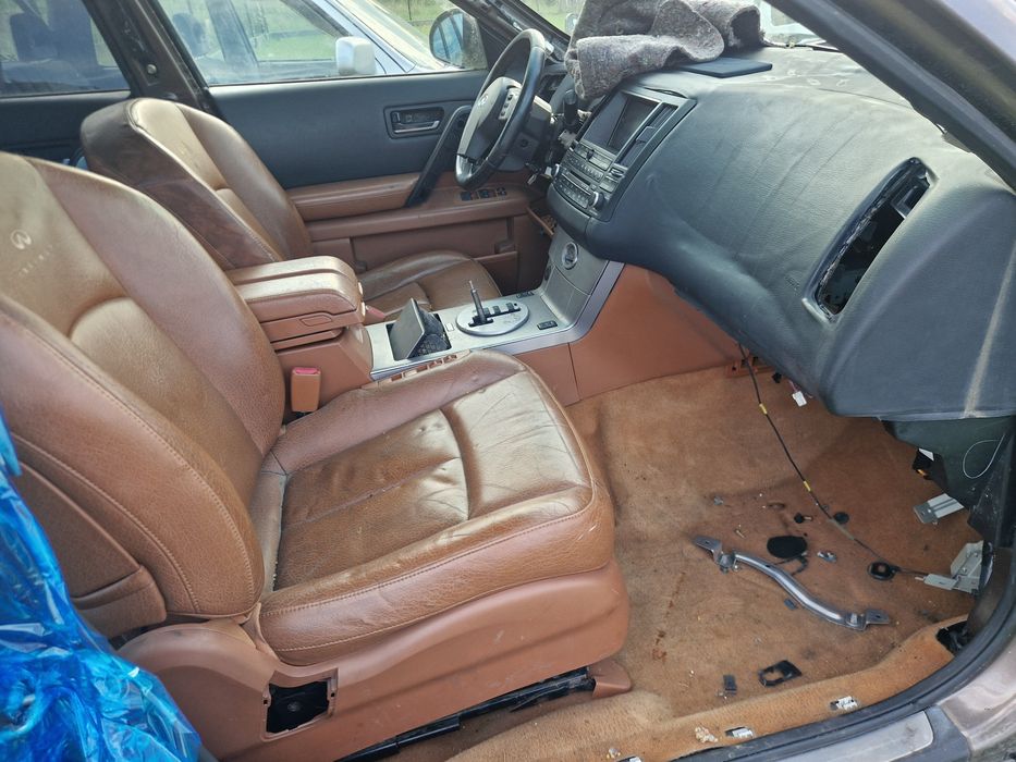 Srodek infiniti fx35 brązowy fotele kanapa boczki dywan