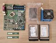 Części starego serwera, płyta główna, dyski HDD serwerowe, pamięć ram
