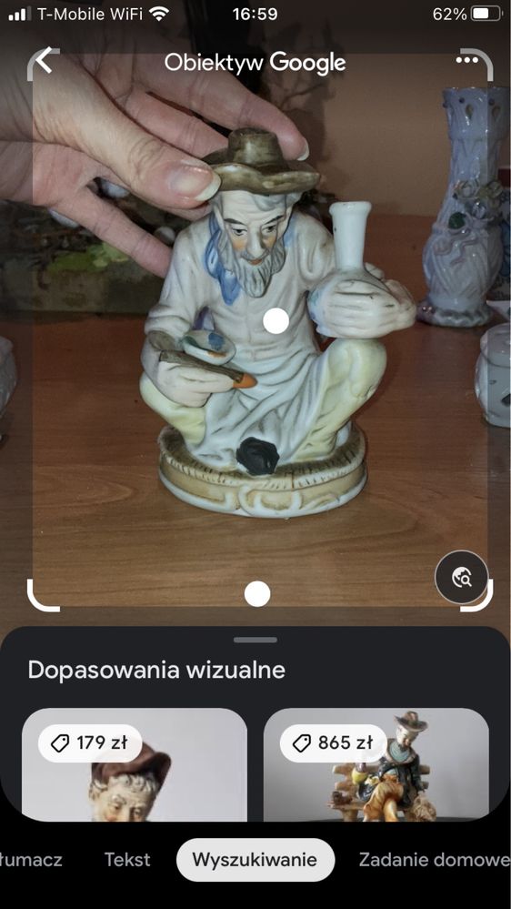 Figurka porcelanowa malarz