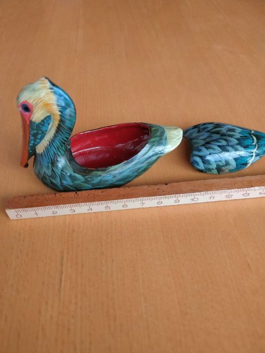 Conjunto de patos em madeira.