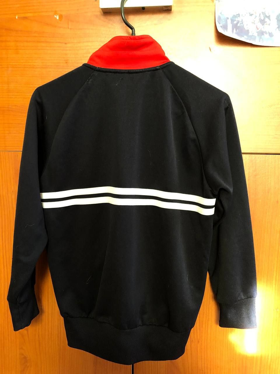 Зіпка Sergio Tacchini
