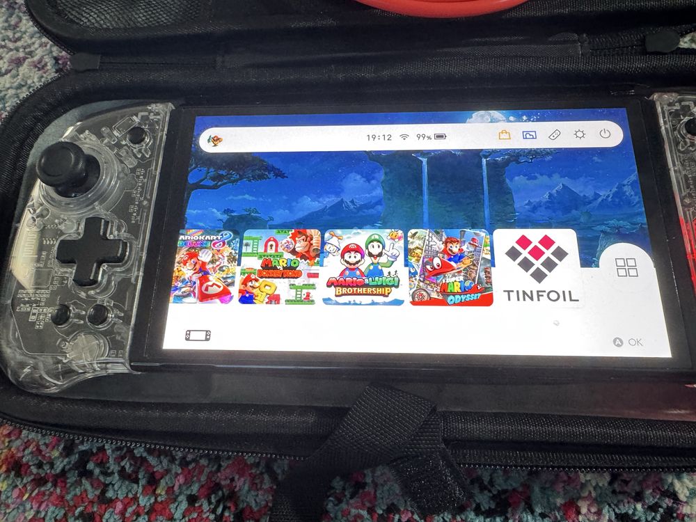 Switch OLED Desbloqueda - Varios jogos , comandos extra e acessórios