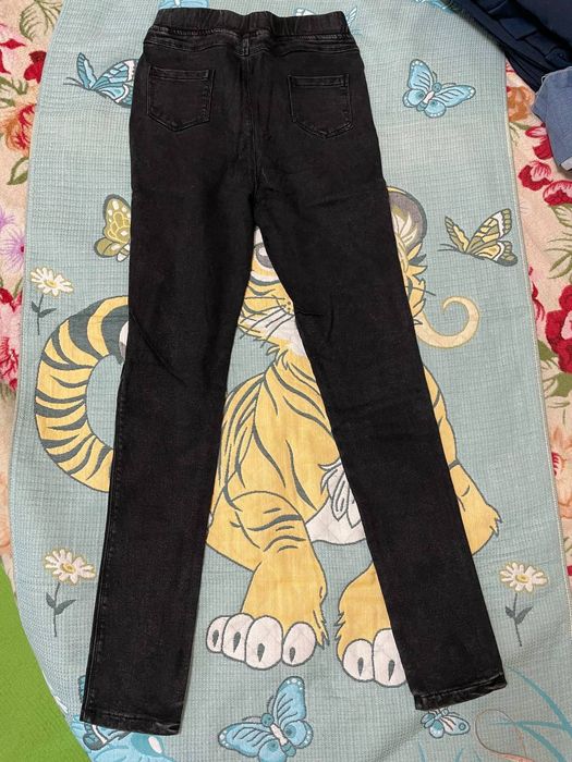 Штани утеплені чорного кольору