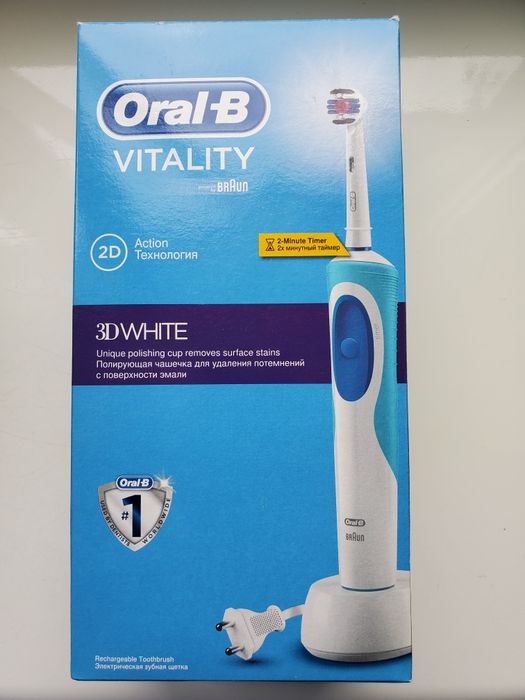 Електрическая зубная щетка  Oral-В