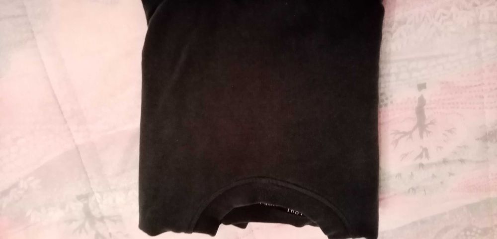 Camisola verde com interior em plástico