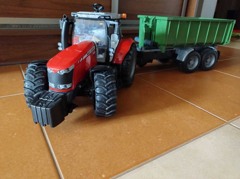 Bruder traktory kombajny przyczepy