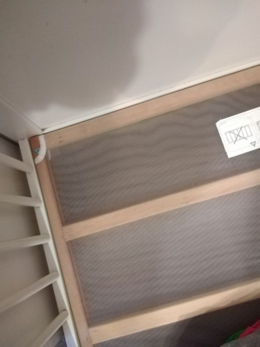 Białe łóżeczko dla dziecka drewniane