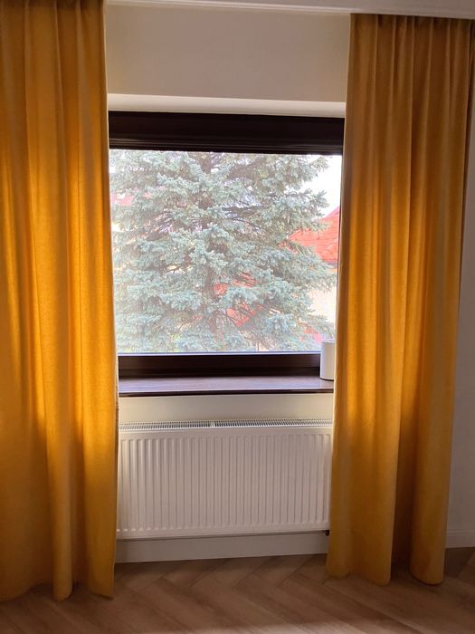 Zasłony, poszewki i dywan
