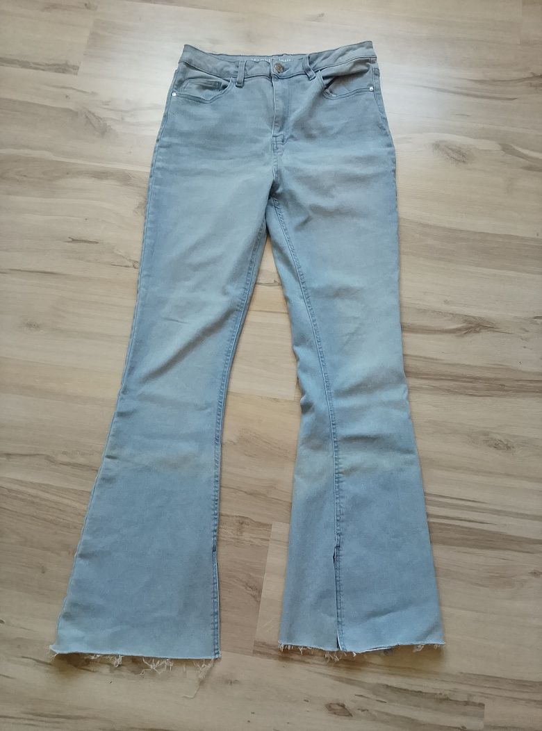 Jasne spodnie dzwony 40/L