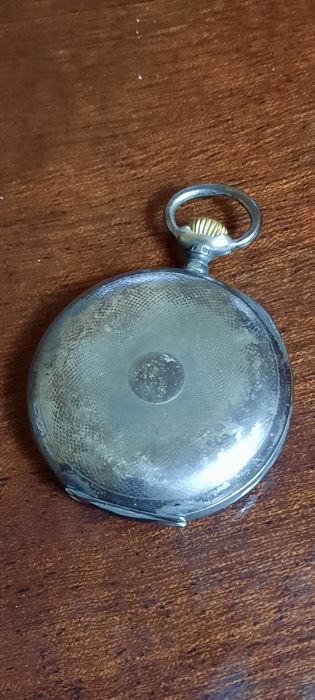 Relógio de bolso antigo Omega em prata 15 rubis