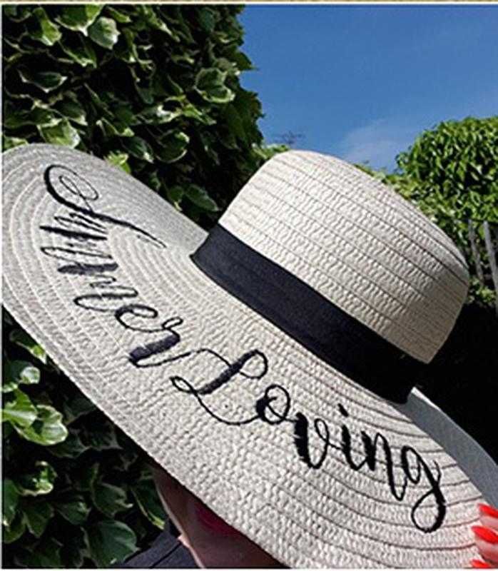 Солом'яний капелюх з широкими полями і написом summer loving від joico